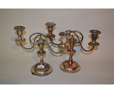 19th Century plate on copper candlestick and a pair of similar twin light candelabra