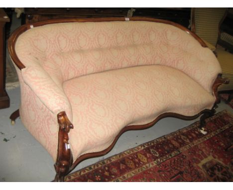 Victorian button upholstered three seat sofa on cabriole front supports with casters