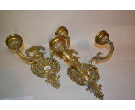 Pair of ornate gilt brass two branch wall lights together with a small trunk containing sundry metalware