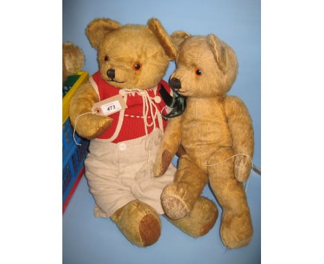 Gold plush covered teddy bear wearing a red waistcoat together with a similar Chad Valley teddy bear