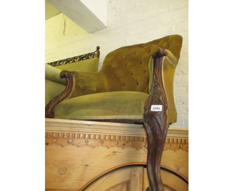 Victorian button upholstered and carved mahogany tub shaped chair on cabriole front supports (a/f)