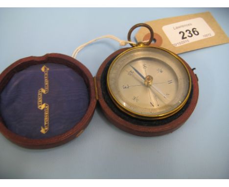 Brass pocket compass in original red Morocco leather covered case, the case marked Stanley, Great Turnstile, Holborn, W.C.
