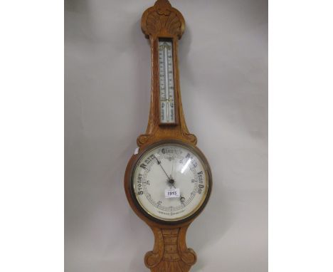 Late Victorian carved oak aneroid barometer / thermometer