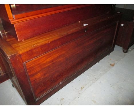 19th Century mahogany trunk with a hinged cover