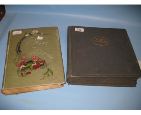 Two large Edwardian postcard albums containing approximately 500 postcards