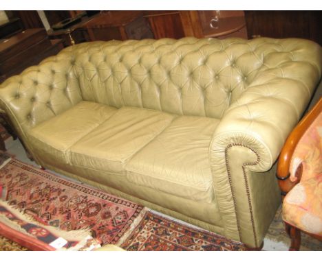 Green buttoned leather upholstered three seater Chesterfield sofa