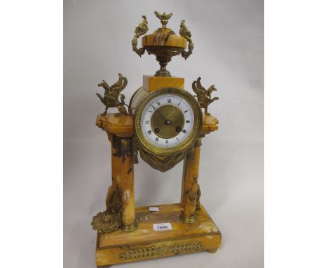 French variegated marble and gilt metal portico clock with urn surmount, the circular enamel dial with Arabic and Roman numer