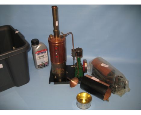 Kit built green painted brass, wooden and copper bound stationary engine together with another stationary engine by U.S.E. wi