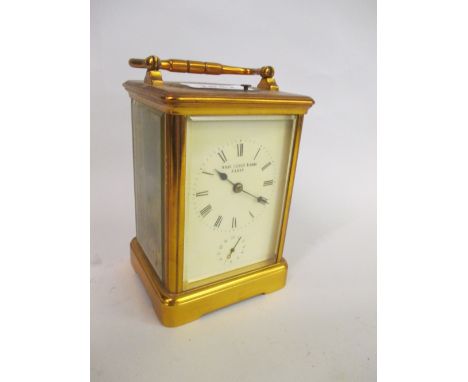 20th Century brass cased repeating carriage clock having enamel dial with Roman numerals and subsidiary seconds, inscribed Ro
