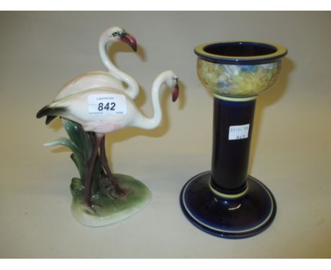 Modern Vienna group of flamingoes together with a Jersey pottery candlestick