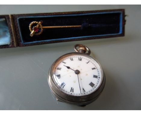 Victorian 9ct gold ruby set stick pin, together with a silver cased fob watch