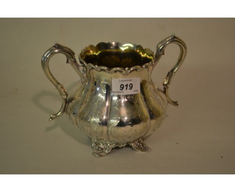 Victorian silver two handled sugar basin of baluster fluted form with engraved decoration and shaped feet, London 1861