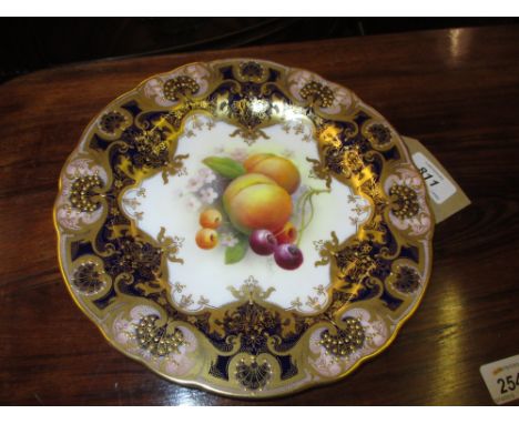Royal Worcester cabinet plate painted with peaches and cherries by A. Shuck on a mottled ground within an ornate blue, gilt a
