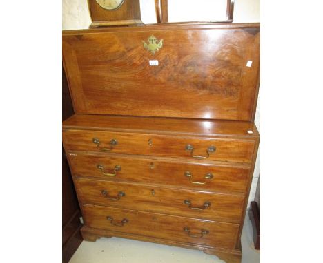 An unusual George III mahogany bureau side cabinet, the caddy moulded carcass with fall front enclosing a fitted interior wit