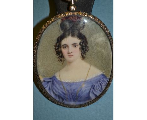 Good quality 19th Century oval watercolour miniature head and shoulder portrait of a lady housed in a gold plated frame