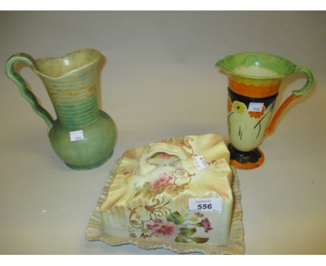 Carlton Ware (W. and R. mark) floral decorated cheese dish and cover together with two Art Deco pottery jugs