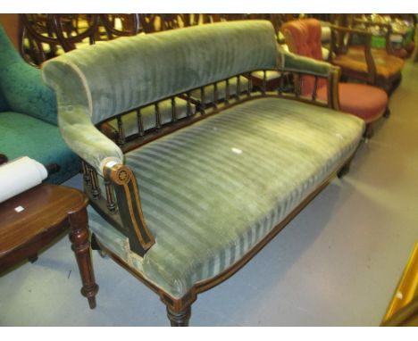 19th Century burr walnut line inlaid and ebonised two seat sofa having padded and spindle back and overstuffed seat raised on