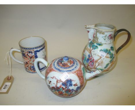 Chinese Imari mug with floral enamel decoration, together with a similar teapot and a 19th Century Chinese jar (handle replac