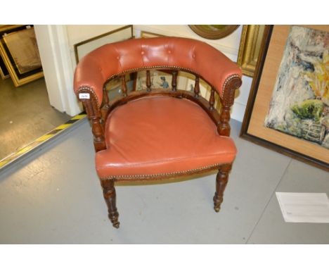 Victorian walnut and leather upholstered desk chair, the horseshoe shaped back with button upholstery on baluster turned upri