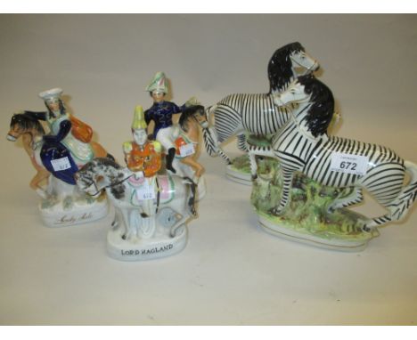 Pair of Staffordshire flat back figures of zebra, another pair of smaller Staffordshire flat backs of Sir R. Sale and Lady Sa