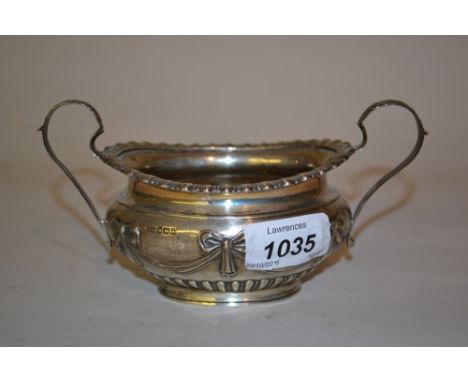 Sheffield silver oval two handled sugar bowl decorated with ribbons, 1900