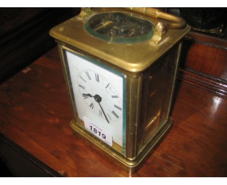 Brass cased carriage clock, the enamel dial with Roman numerals and single train movement (a/f)