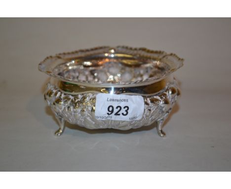 Sheffield silver bowl of embossed floral design on three shaped supports