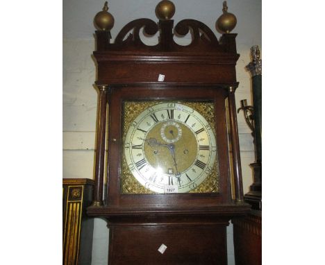 George III oak longcase clock, the square hood with a pierced pediment above a square door raised on bracket supports, the gi