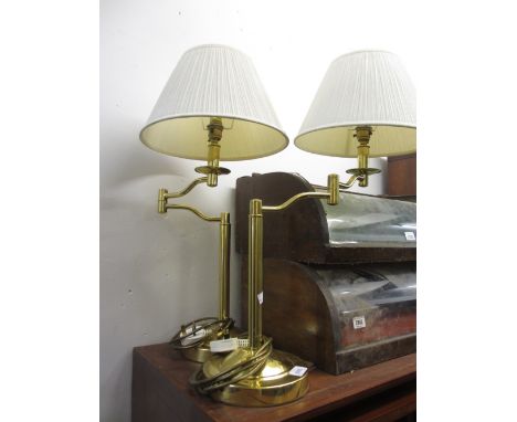 Pair of 20th Century brass adjustable table lamp bases with shades