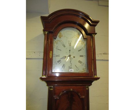 Mahogany longcase clock, the broken arch hood with flanking pilasters above a figured, arched and moulded panel door with con