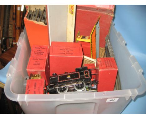 Hornby 0 gauge 0-4-0 clockwork tank engine together with a quantity of other 0 gauge accessories and track, some in original 