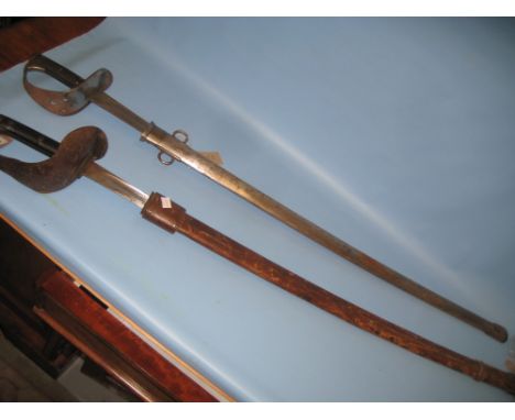 19th Century Continental steel sabre with gnurled grip and pierced hilt in a steel scabbard together with another similar swo