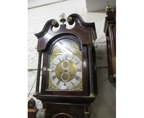 19th Century mahogany longcase clock, the broken arch hood with swan neck pediment above an arched panel door flanked by spir