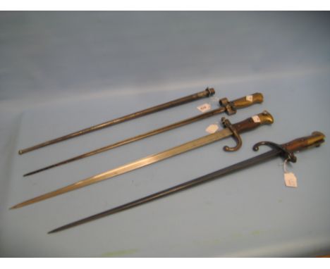 Lebel bayonet with scabbard and two Gras bayonets (no scabbards)