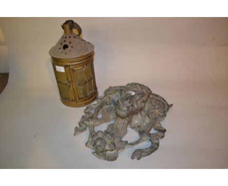 20th Century cast lead wall applique in the form of a rams head together with a brass cased circular lantern