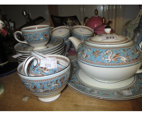 Wedgwood Florentine pattern six place setting tea service including a teapot together with a porcelain cabaret set with tray