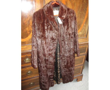 Ladies three quarter length fur coat with label for Hickleys, furriers