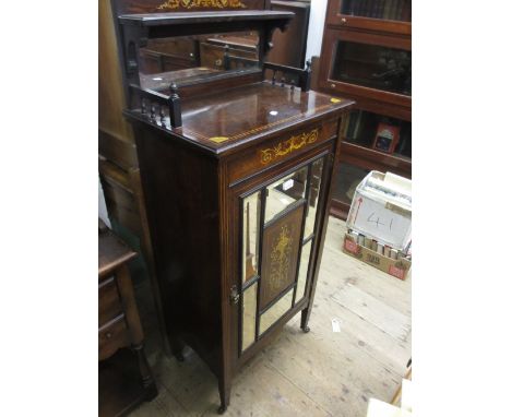 Edwardian rosewood line inlaid music cabinet having mirrored galleried back above a panelled mirrored door on square tapering