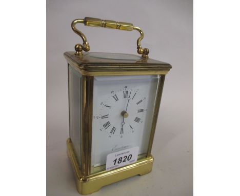 Modern gilt brass cased carriage clock, the enamel dial with Arabic and Roman numerals inscribed Eurotime with single train m
