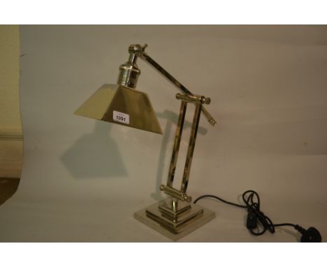 Silver plated adjustable desk lamp on stepped base