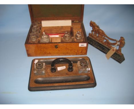 Oak cased medical box containing a quantity of various bottles, scales etc, ebonised and walnut two bottle desk stand and a p