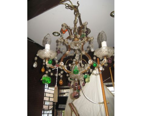 Early 20th Century Continental gilt metal and glass light fitting with coloured drops