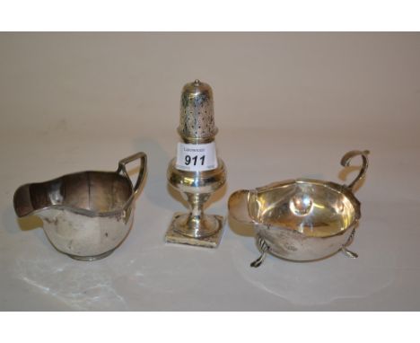 Georgian London silver circular pedestal pepper, Birmingham silver cream jug (a/f) and another helmet shaped cream jug (a/f)