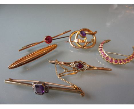 9ct Gold crescent brooch, a 9ct gold amethyst set brooch and four various bar brooches