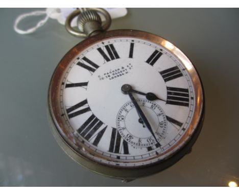Silver plated Goliath pocket watch with enamel dial having Roman numerals and subsidiary seconds inscribed C. Packer and Co. 