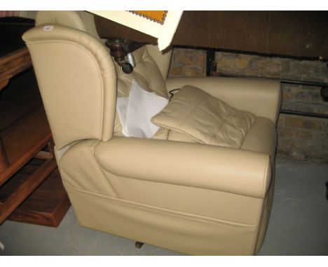 Modern leather upholstered recliner armchair with integral reading light etc