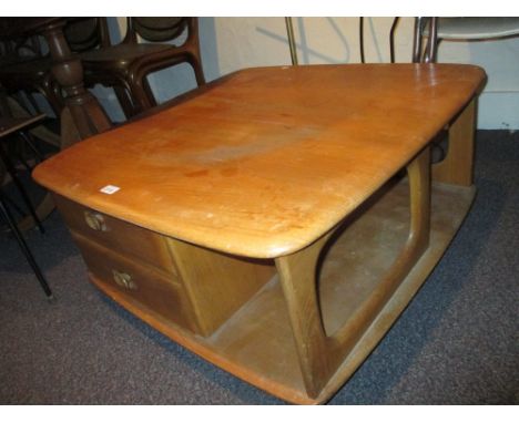 Ercol light ash Pandora's box coffee table with integral cubby holes and drawers (a/f)