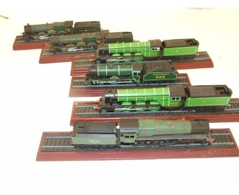 6 MOUNTED MODEL TRAINS