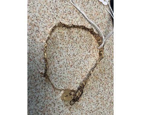 A 9 ct gold gate bracelet 4.8 grams with safety chain
