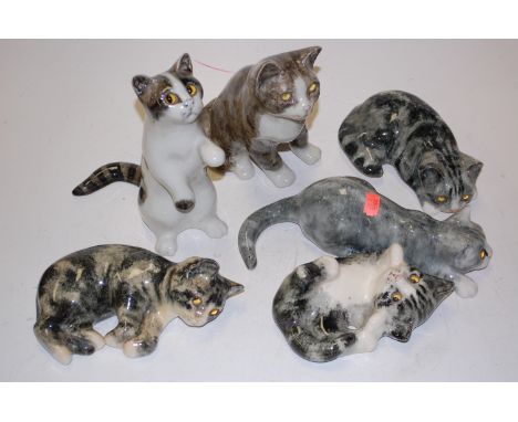 Six various glazed ceramic cats to include Winstanley